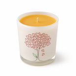 Luxury beeswax candle in elegant glass jar with natural wax