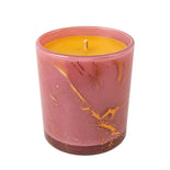 Decorative pink beeswax candle with rose gold lid
